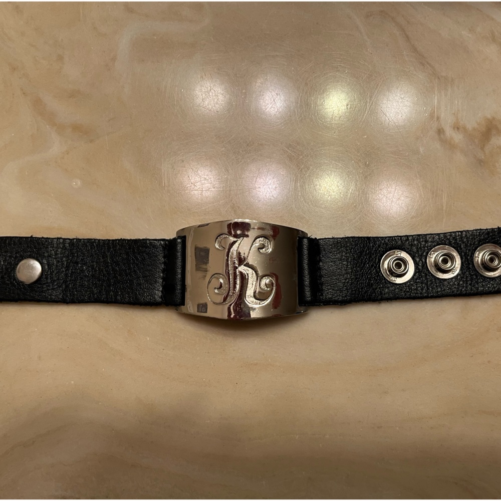 Leather bracelet by Lisa Stewart letter “K”